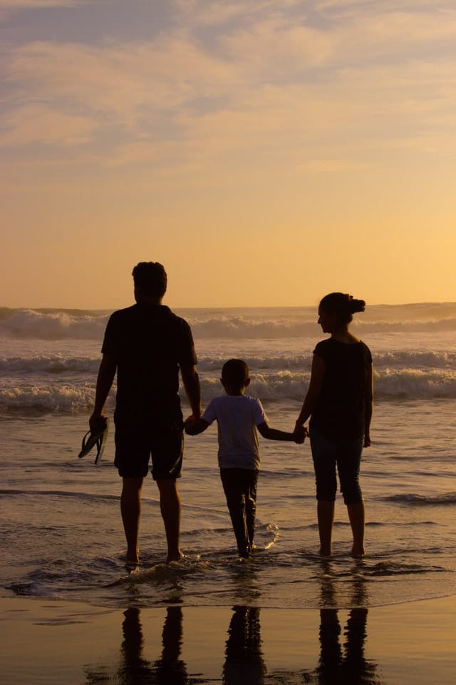Family happy at the beach